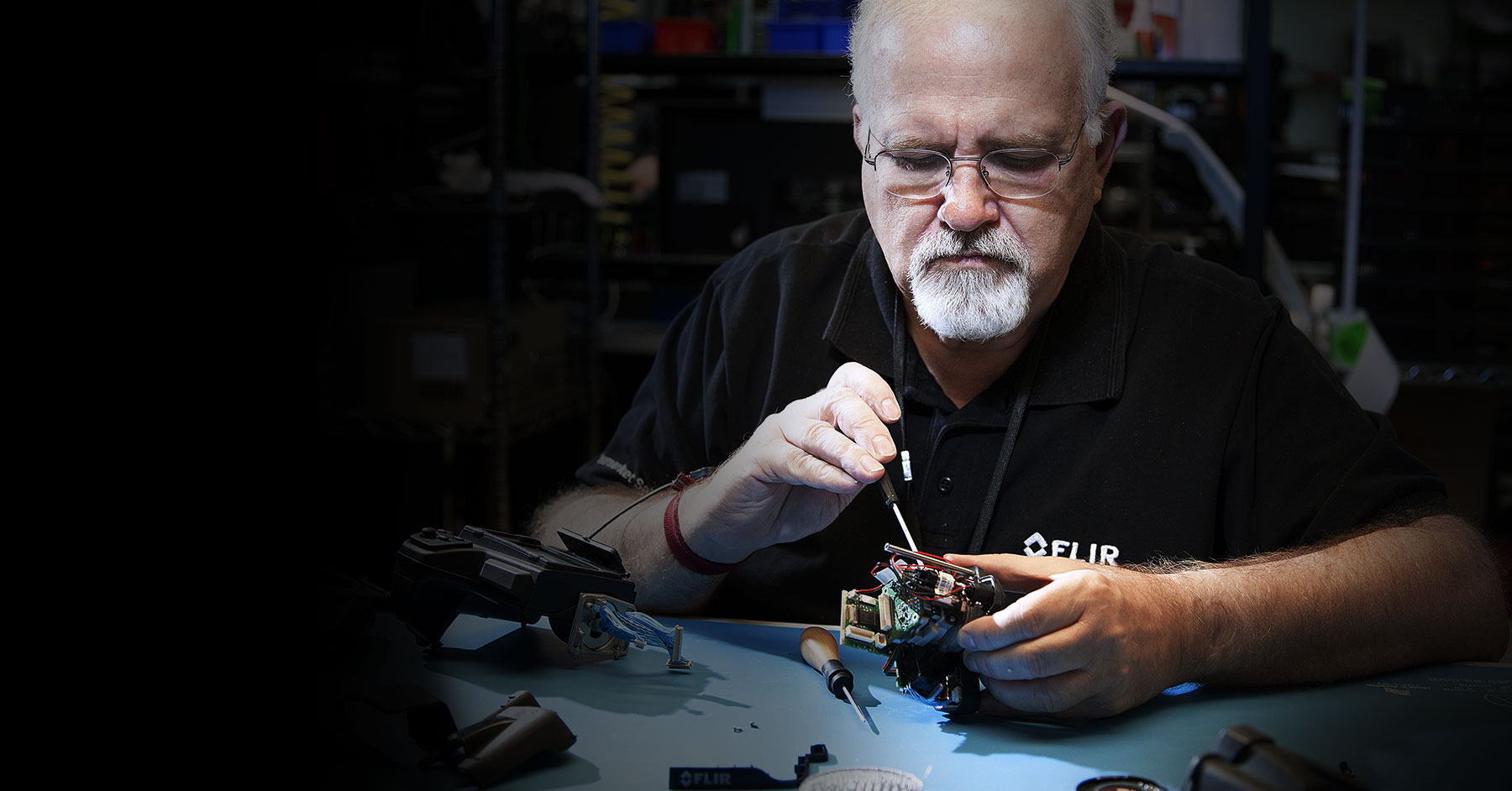 Technician fixing a FLIR product